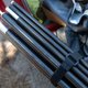 The tension poles and support poles are light but feel sufficiently robust for holding a plane of polyester